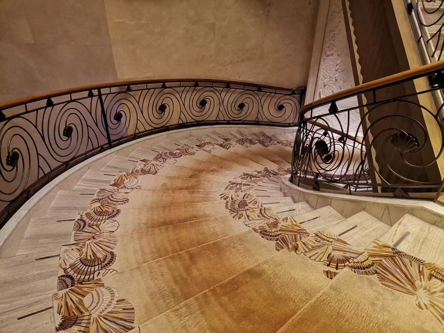 `Custom curved staircase rug for 5-star hotel | 100% New Zealand wool + bamboo silk | Gradient hand-tufted installation