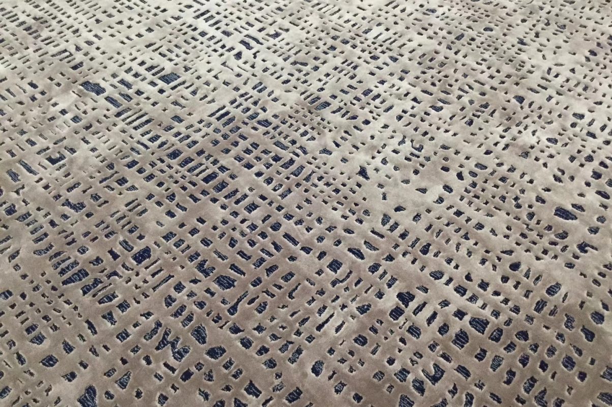 Beige and navy blue abstract cut-pile wool carpet with modern geometric grid design, ideal for luxury interiors
